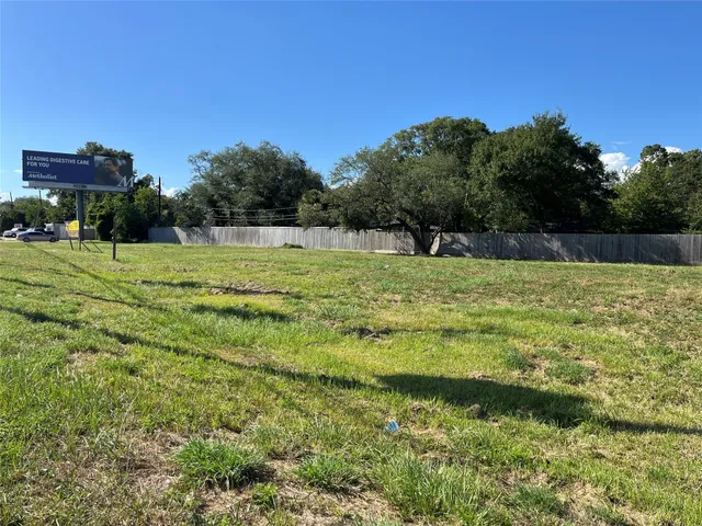 a sign board with parking space