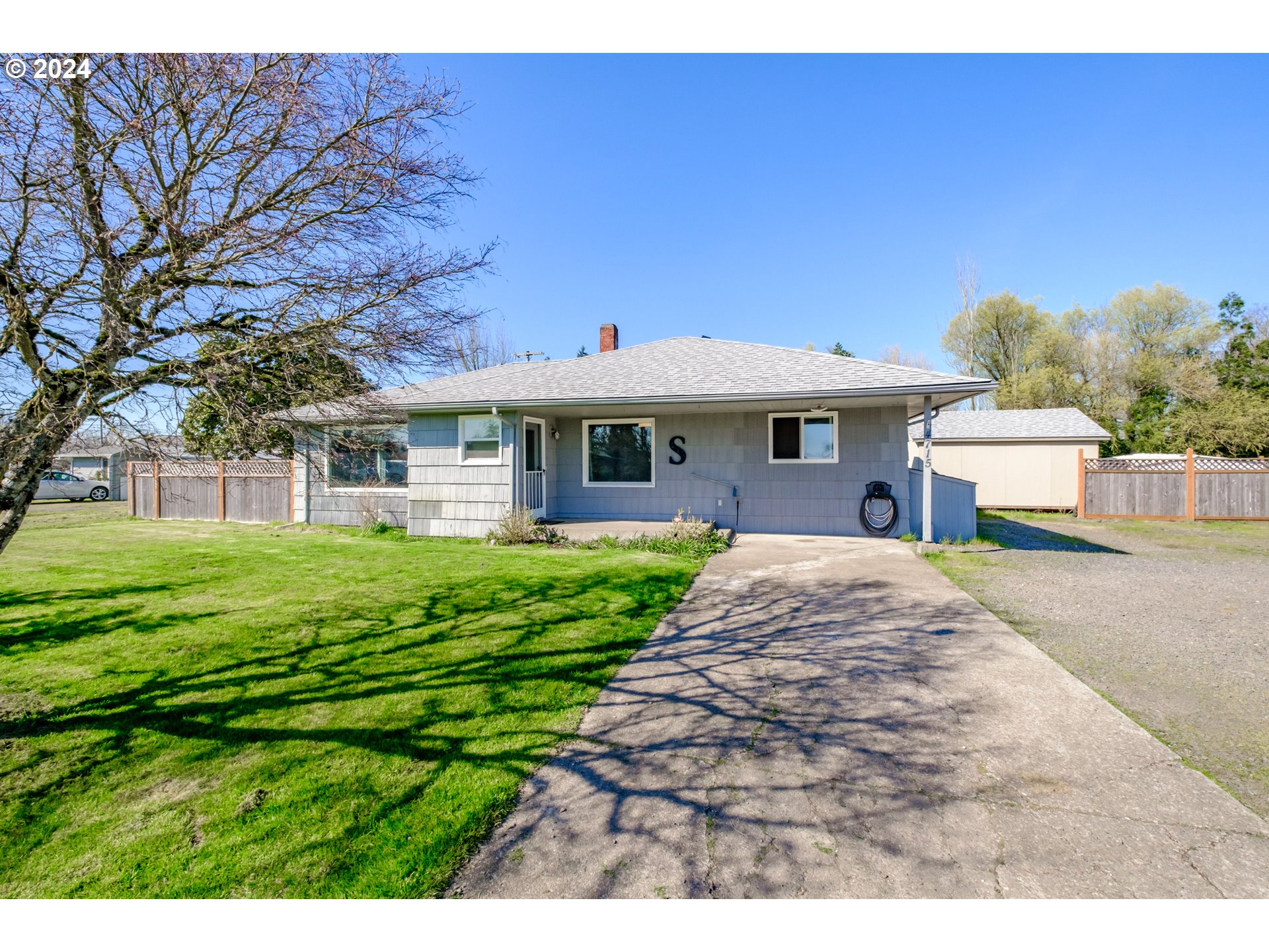 4715 Knox Butte Road East Albany, OR 97322 - Photo 1 of 30 a front view of a house with a yard