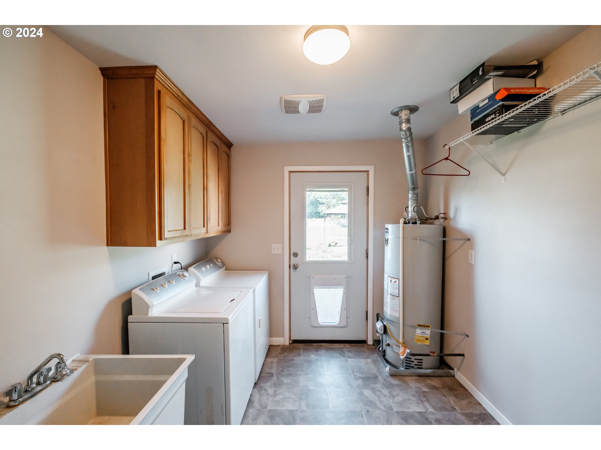 4715 Knox Butte Road East Albany, OR 97322 - Photo 20 of 30 a room with a sink cabinets and utility room