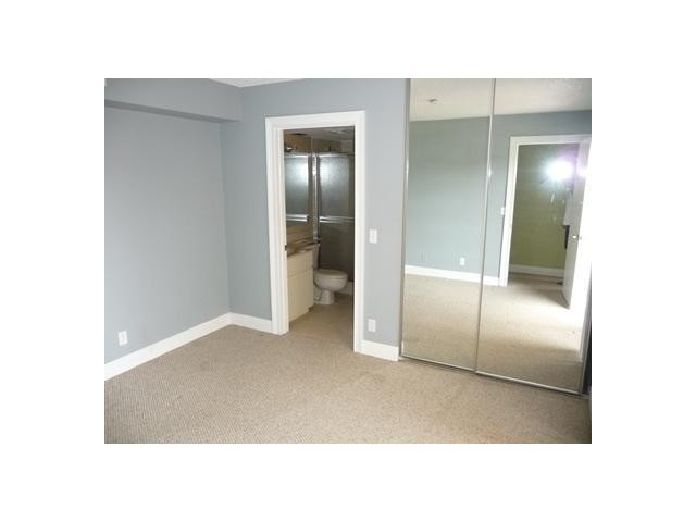 8134 Thames Boulevard, Unit D Boca Raton, FL 33433 - Photo 3 of 6 a open hall with a bathroom