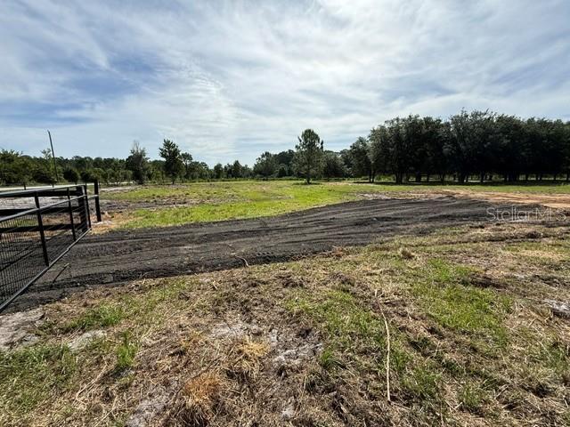 7214 Oil Well Road Clermont, FL 34714 - Photo 11 of 16 a view of a yard with an outdoor space