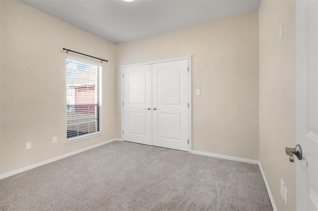 2833 Willow Ridge Circle Granbury, TX 76049 - Photo 15 of 23 a view of an empty room with a window