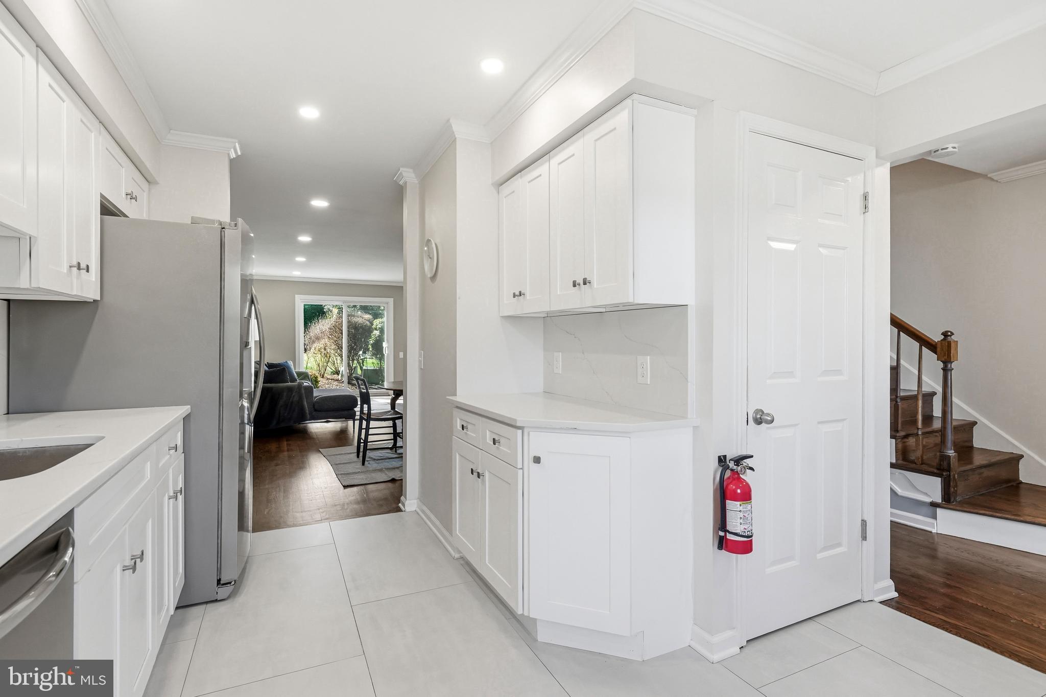 635 East Main Street, Unit 7 Moorestown, NJ 08057 - Photo 12 of 52 a kitchen with cabinets and white appliances