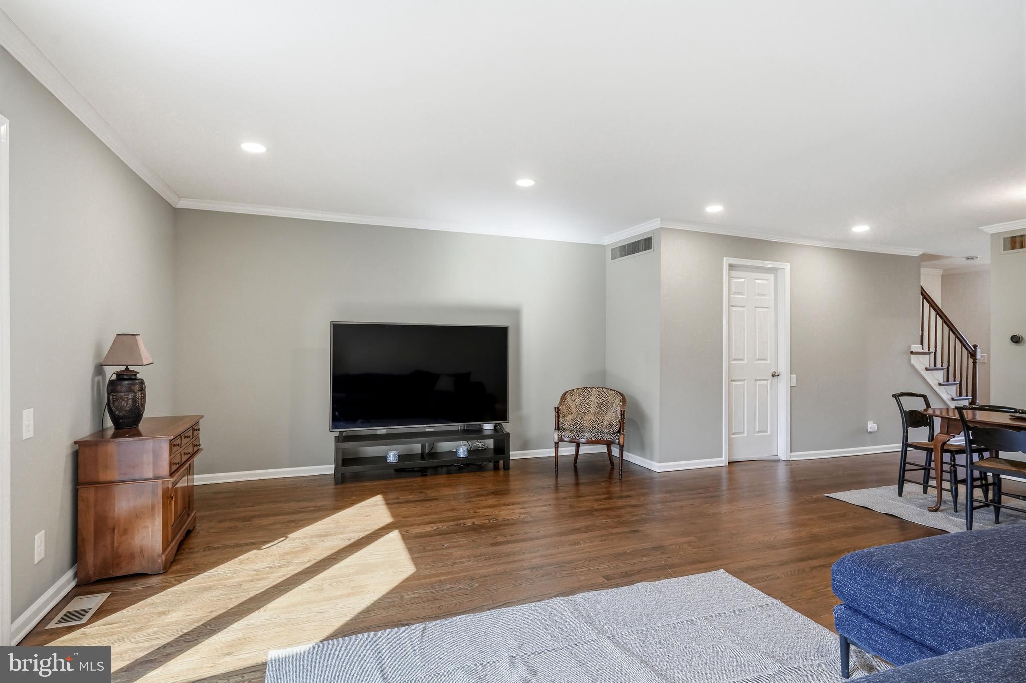 635 East Main Street, Unit 7 Moorestown, NJ 08057 - Photo 20 of 52 a living room with furniture and a flat screen tv