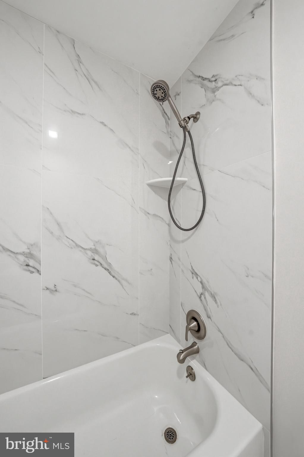 635 East Main Street, Unit 7 Moorestown, NJ 08057 - Photo 29 of 52 a bathroom with a bath tub with a shower