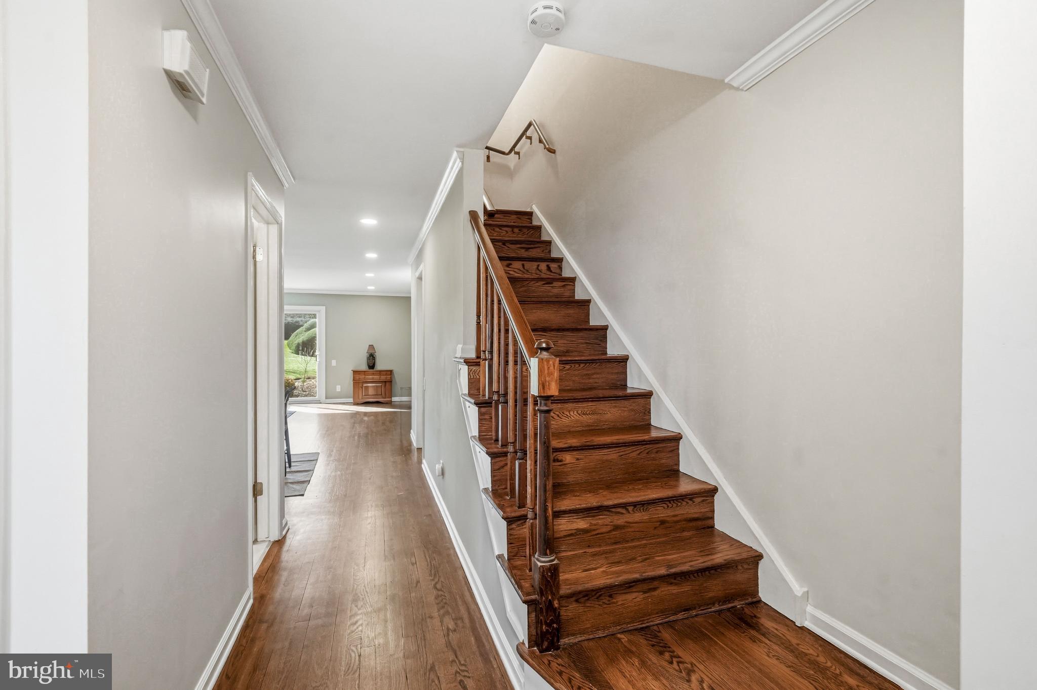 635 East Main Street, Unit 7 Moorestown, NJ 08057 - Photo 6 of 52 a view of a hallway with wooden floor and entryway