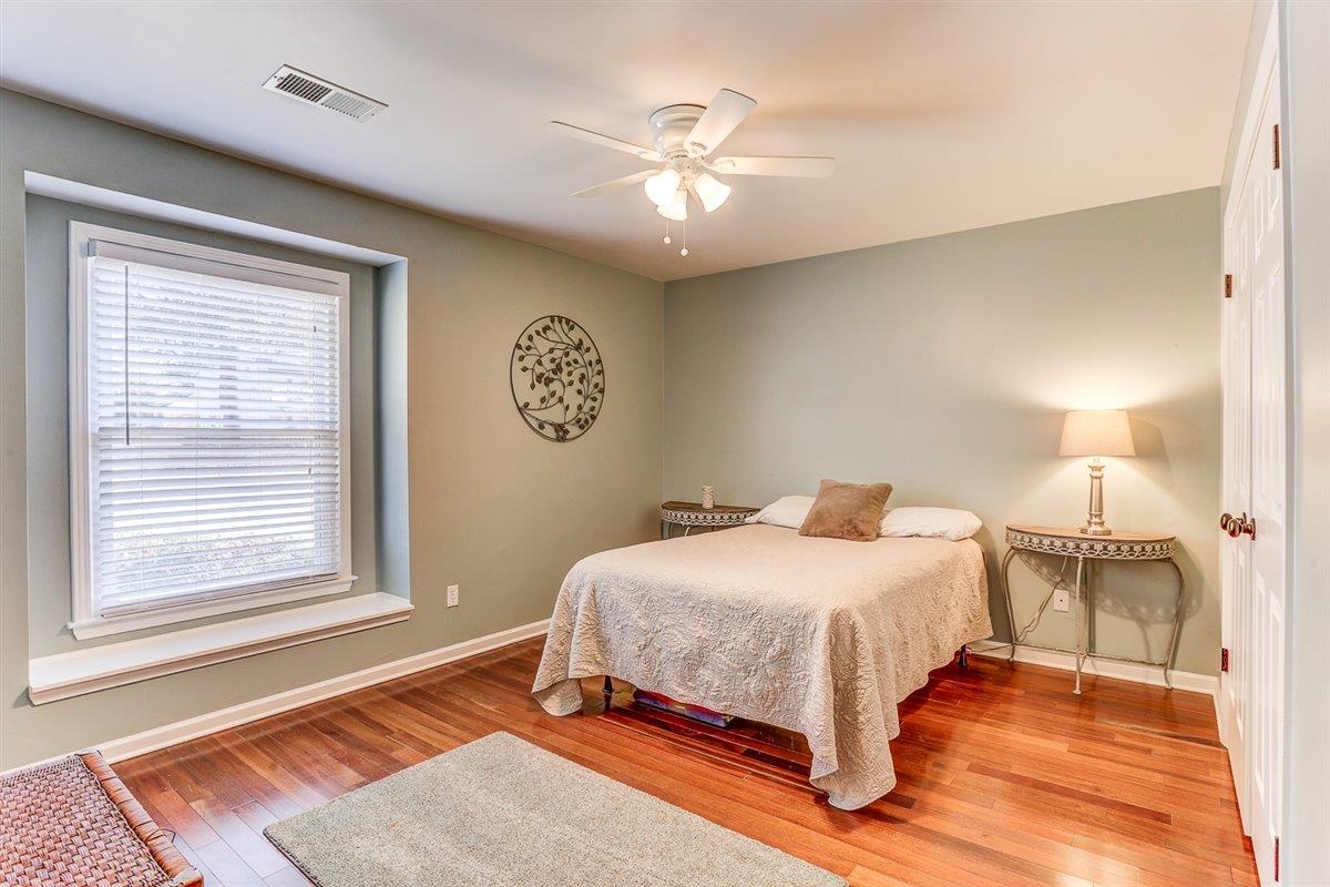 665 Lancelot Lane Collierville, TN 38017 - Photo 15 of 26 a bedroom with a bed and a window