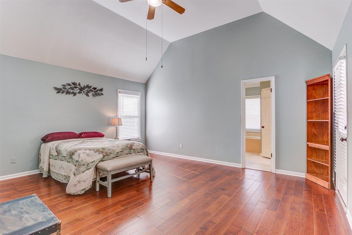 665 Lancelot Lane Collierville, TN 38017 - Photo 18 of 26 a bedroom with a bed and a window