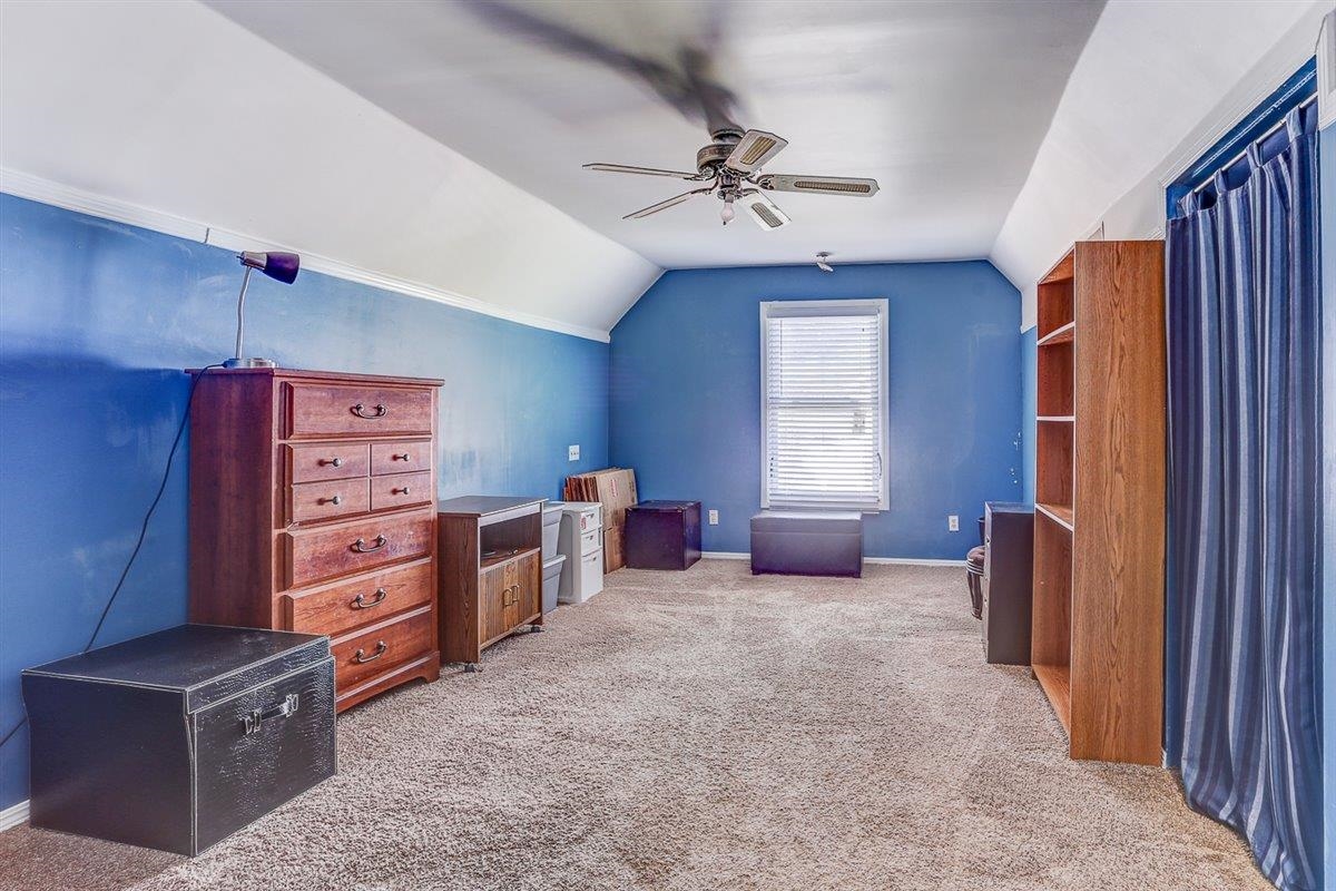 665 Lancelot Lane Collierville, TN 38017 - Photo 22 of 26 a living room with furniture and windows