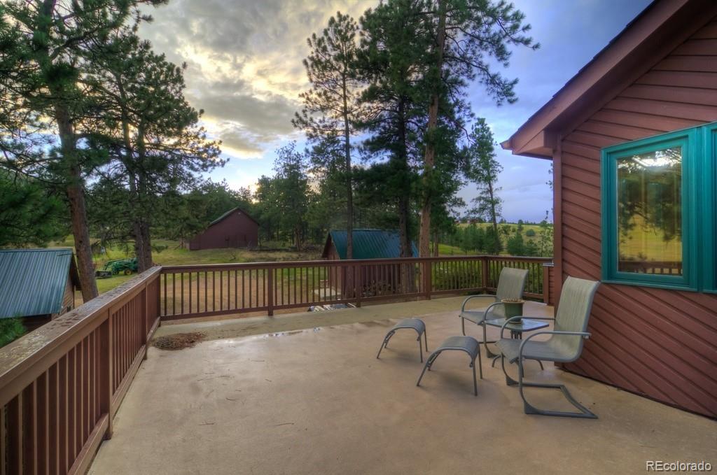 11711 Rist Canyon Road Bellvue, CO 80512 - Photo 33 of 39 a view of a chair and tables in the balcony