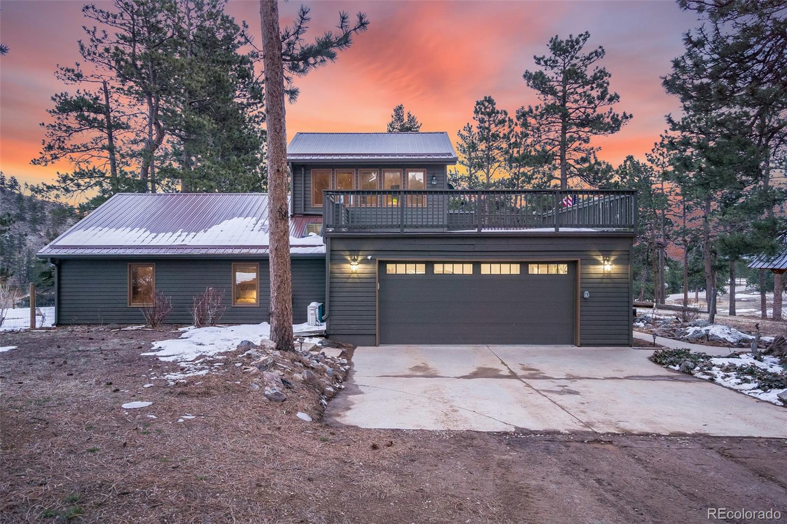 11711 Rist Canyon Road Bellvue, CO 80512 - Photo 34 of 39 a front view of a house