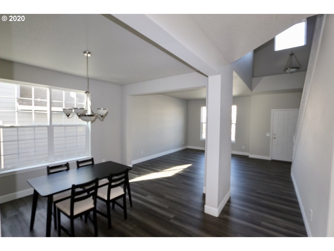 1986 Southwest 33rd Street Gresham, OR 97080 - Photo 12 of 32 a view of a livingroom with furniture and wooden floor