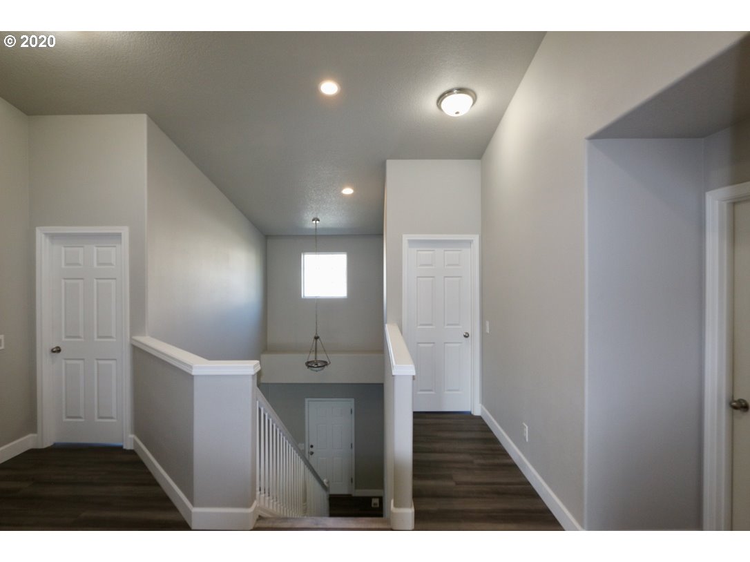 1986 Southwest 33rd Street Gresham, OR 97080 - Photo 19 of 32 a view of hallway with wooden floor