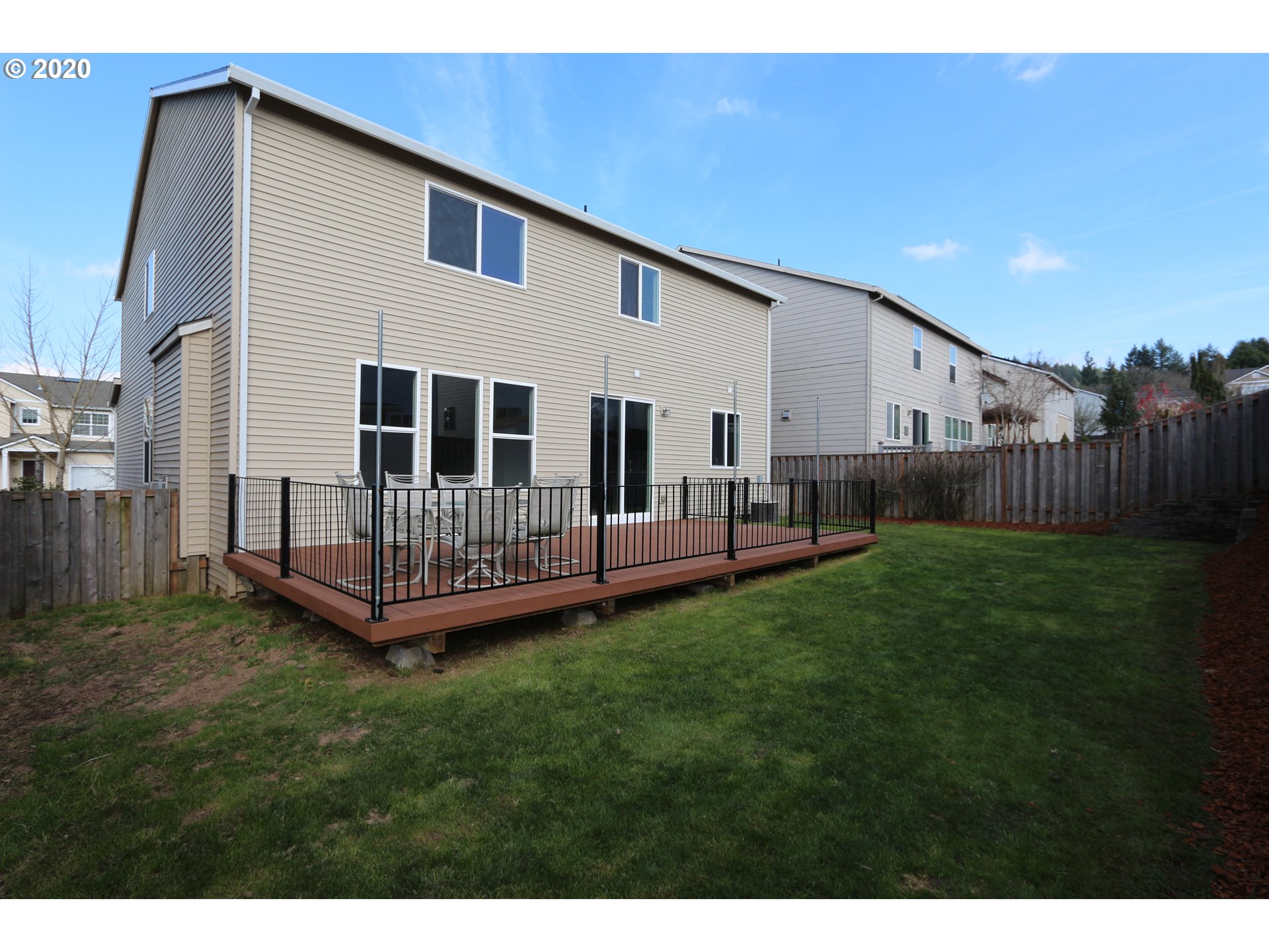 1986 Southwest 33rd Street Gresham, OR 97080 - Photo 6 of 32 a view of a house with backyard and deck