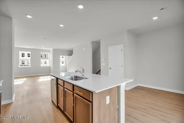 a view of kitchen island wooden floor