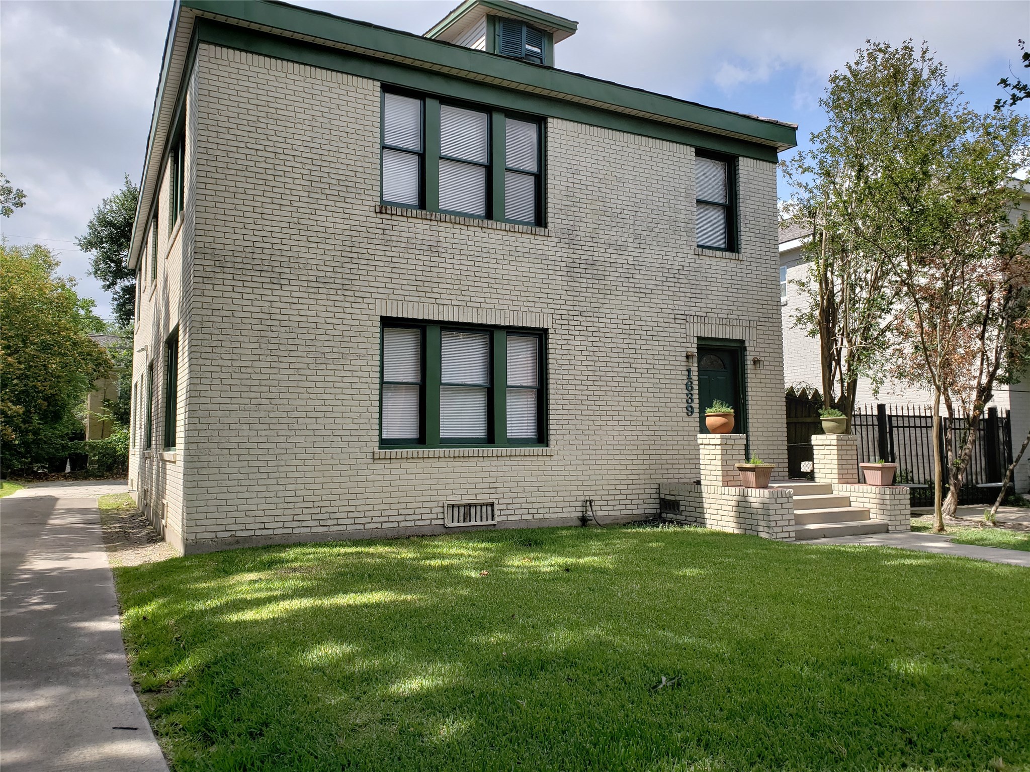a front view of house with yard