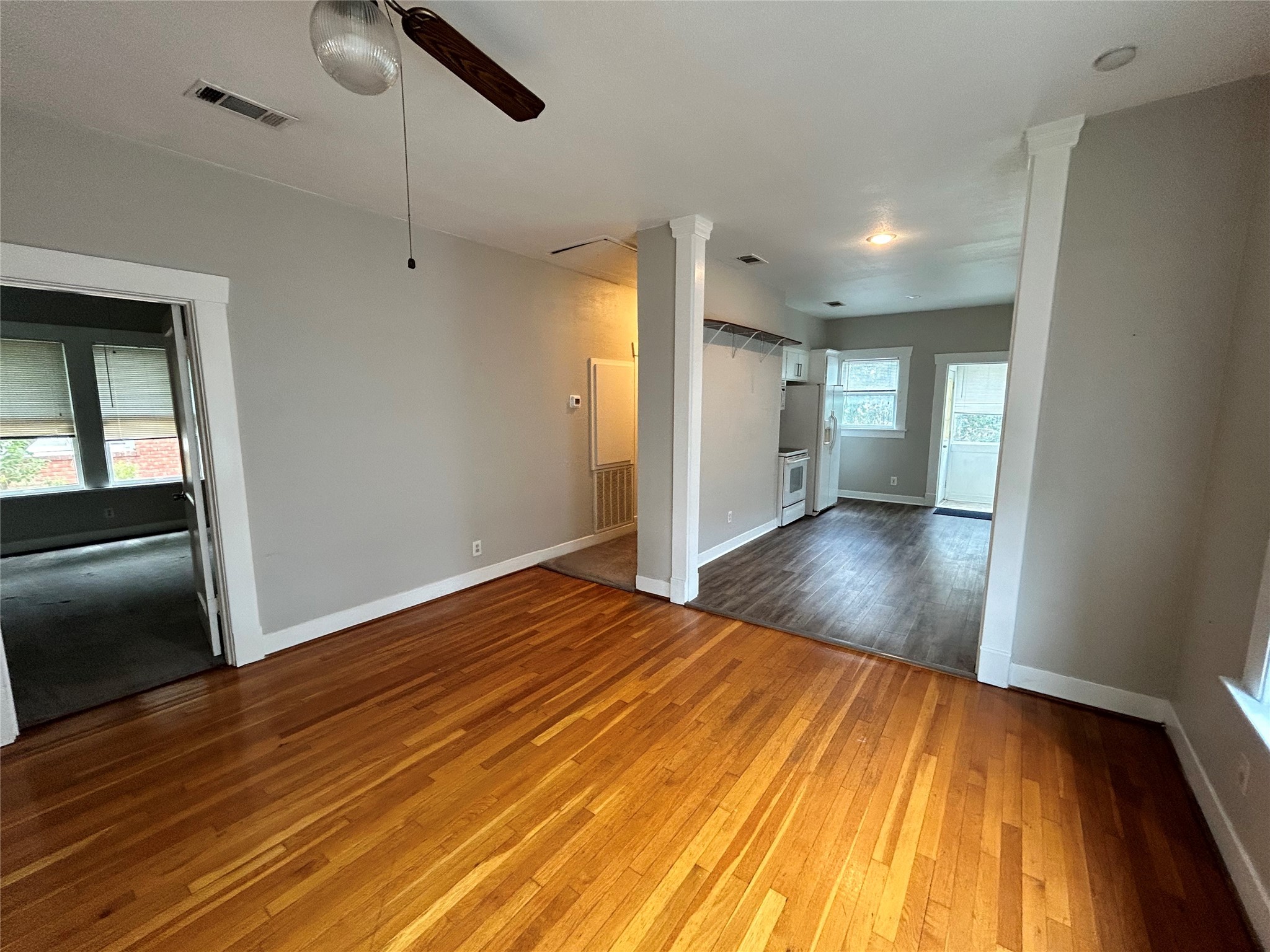 1639 Norfolk Street, Unit 2 Houston, TX 77006 - Photo 7 of 17 a view of a room with wooden floor and staircase