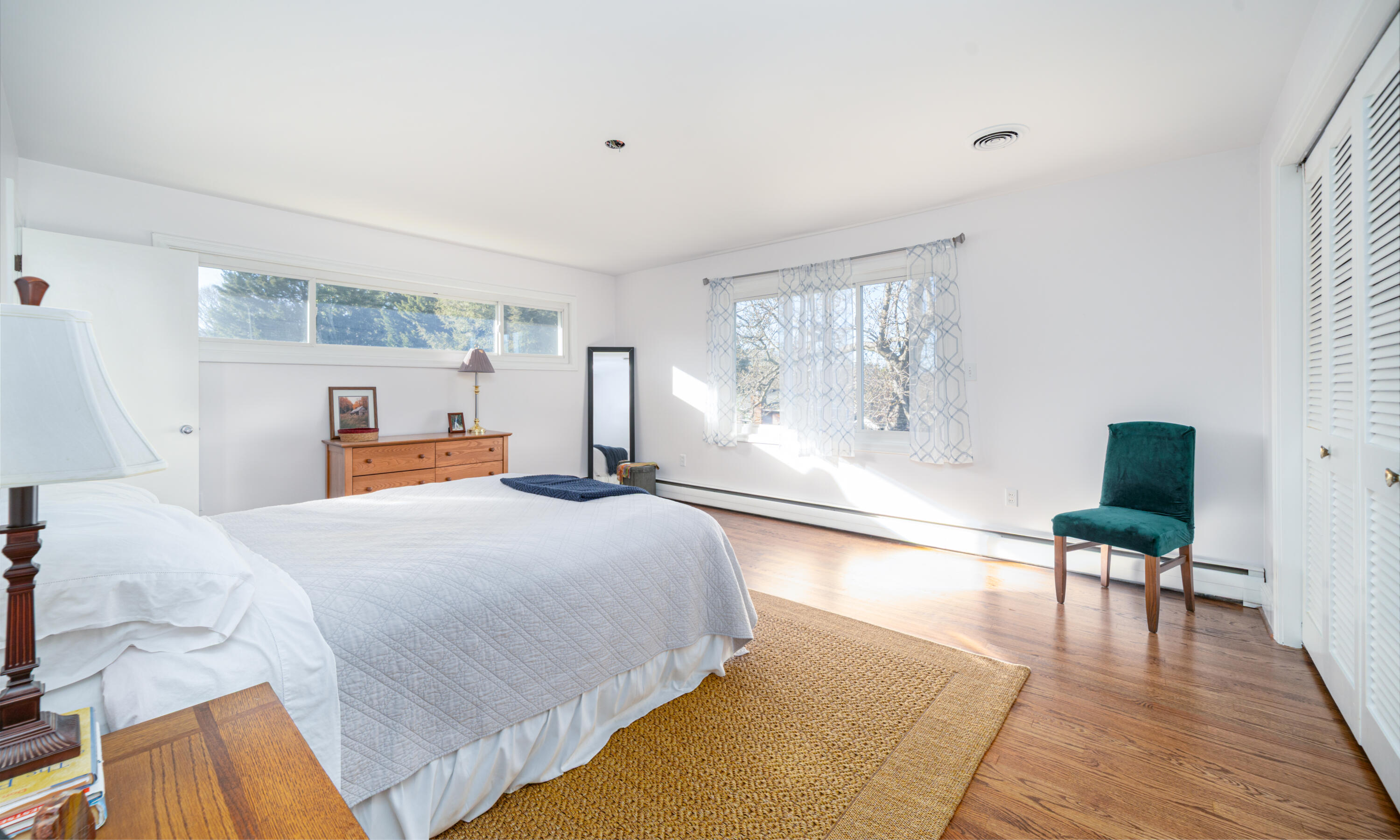 1719 Blair Road Southwest Roanoke, VA 24015 - Photo 19 of 40 a bedroom with a bed and wooden floor