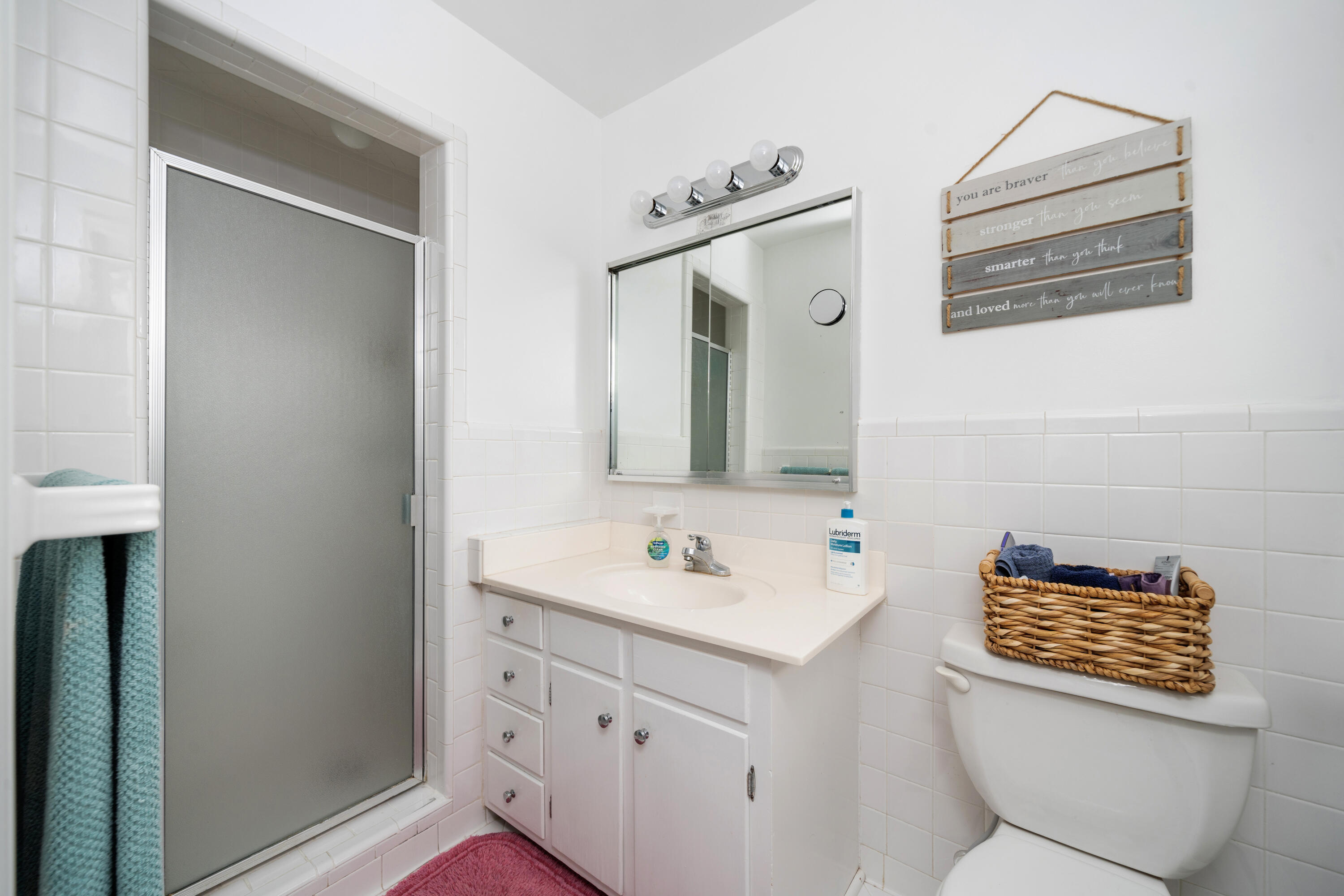 1719 Blair Road Southwest Roanoke, VA 24015 - Photo 20 of 40 a bathroom with a toilet sink and mirror