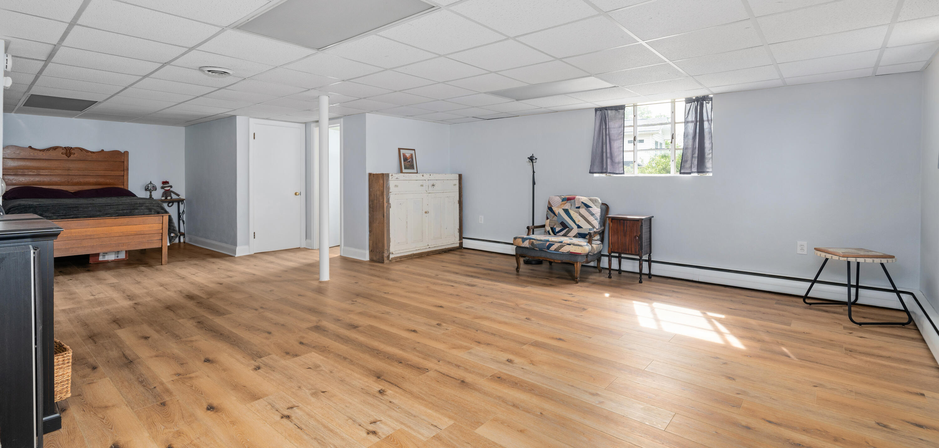 1719 Blair Road Southwest Roanoke, VA 24015 - Photo 25 of 40 a room with furniture and a wooden floor