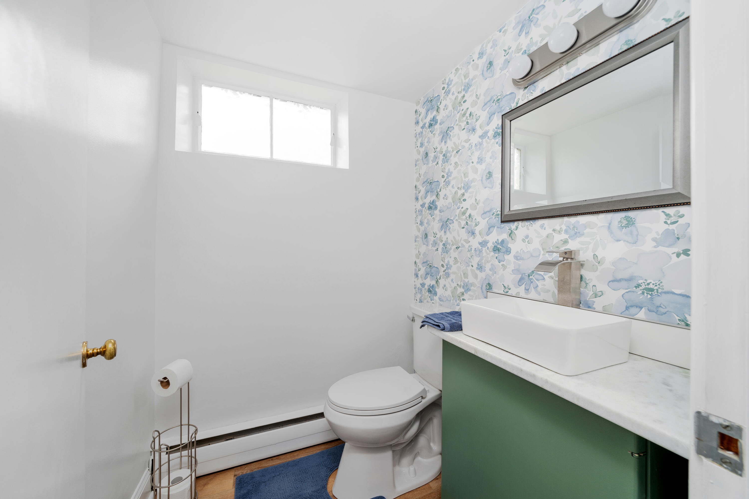 1719 Blair Road Southwest Roanoke, VA 24015 - Photo 28 of 40 a bathroom with a sink a toilet and mirror