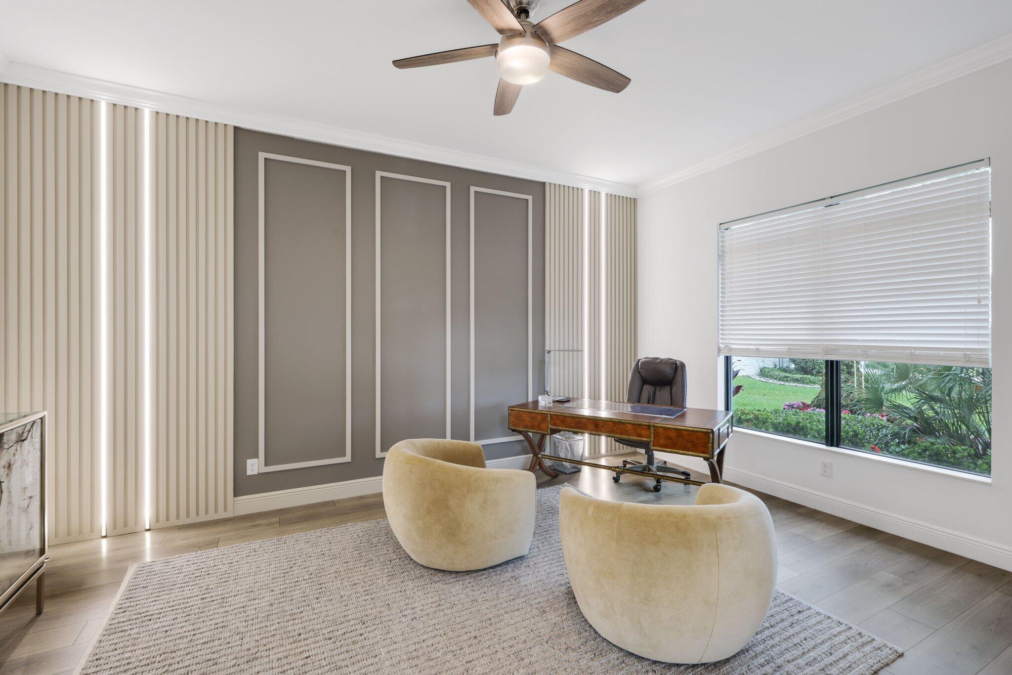 2751 Northwest 70th Boulevard Boca Raton, FL 33496 - Photo 14 of 76 a living room with furniture and a window