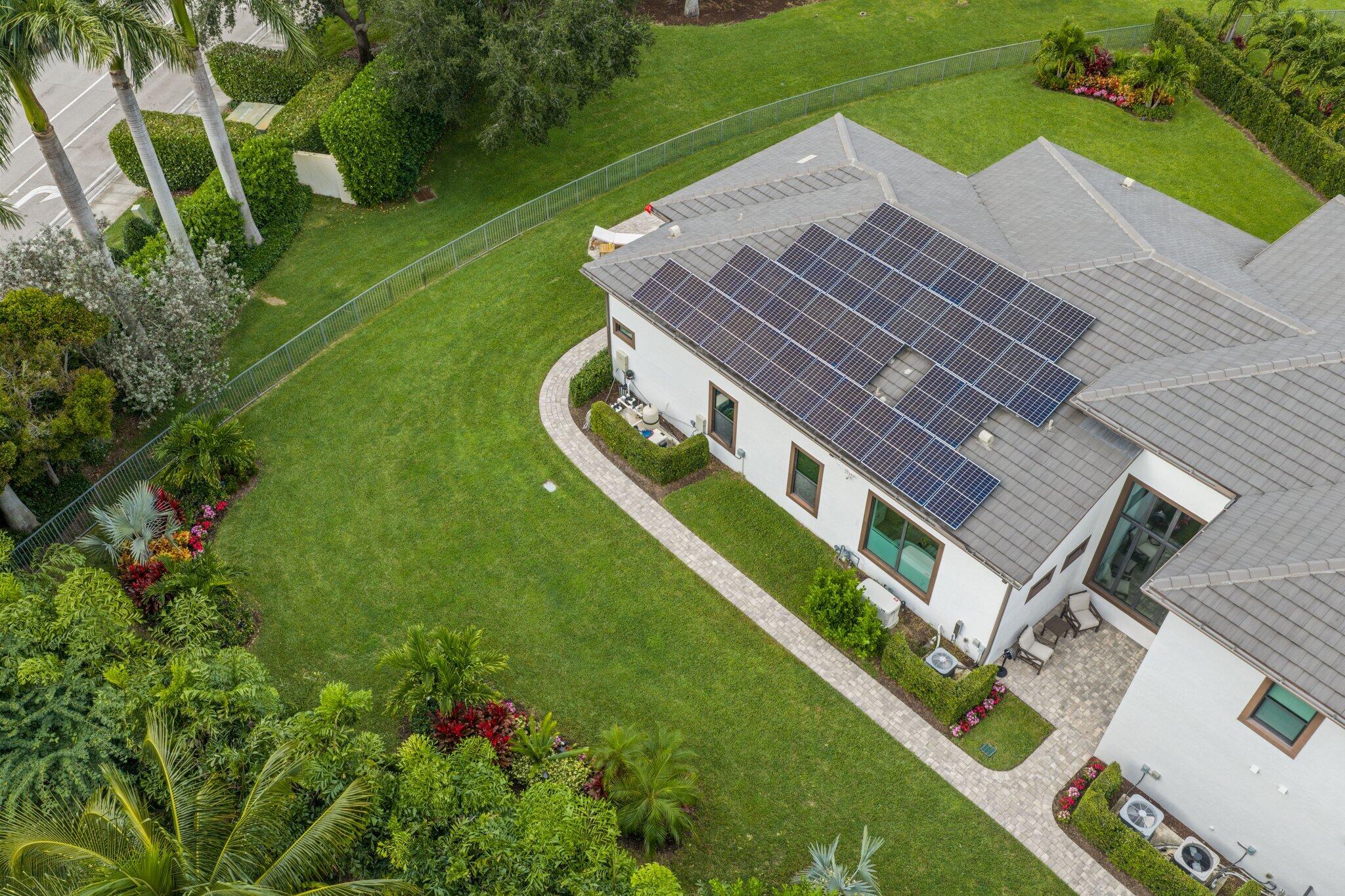 2751 Northwest 70th Boulevard Boca Raton, FL 33496 - Photo 56 of 76 an aerial view of a house