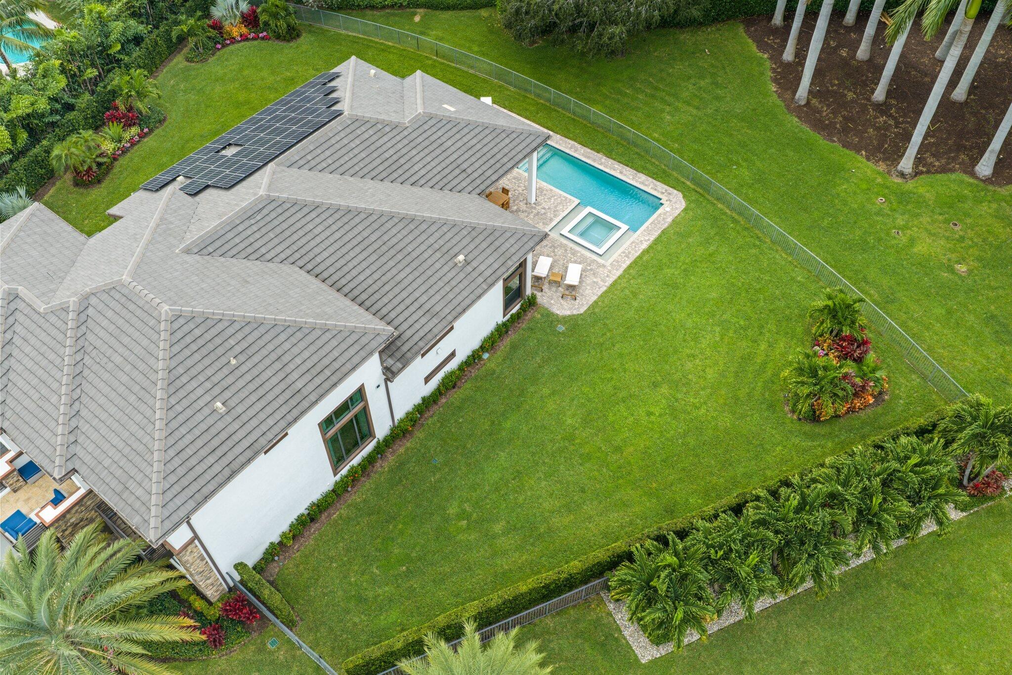 2751 Northwest 70th Boulevard Boca Raton, FL 33496 - Photo 57 of 76 a view of a backyard with garden