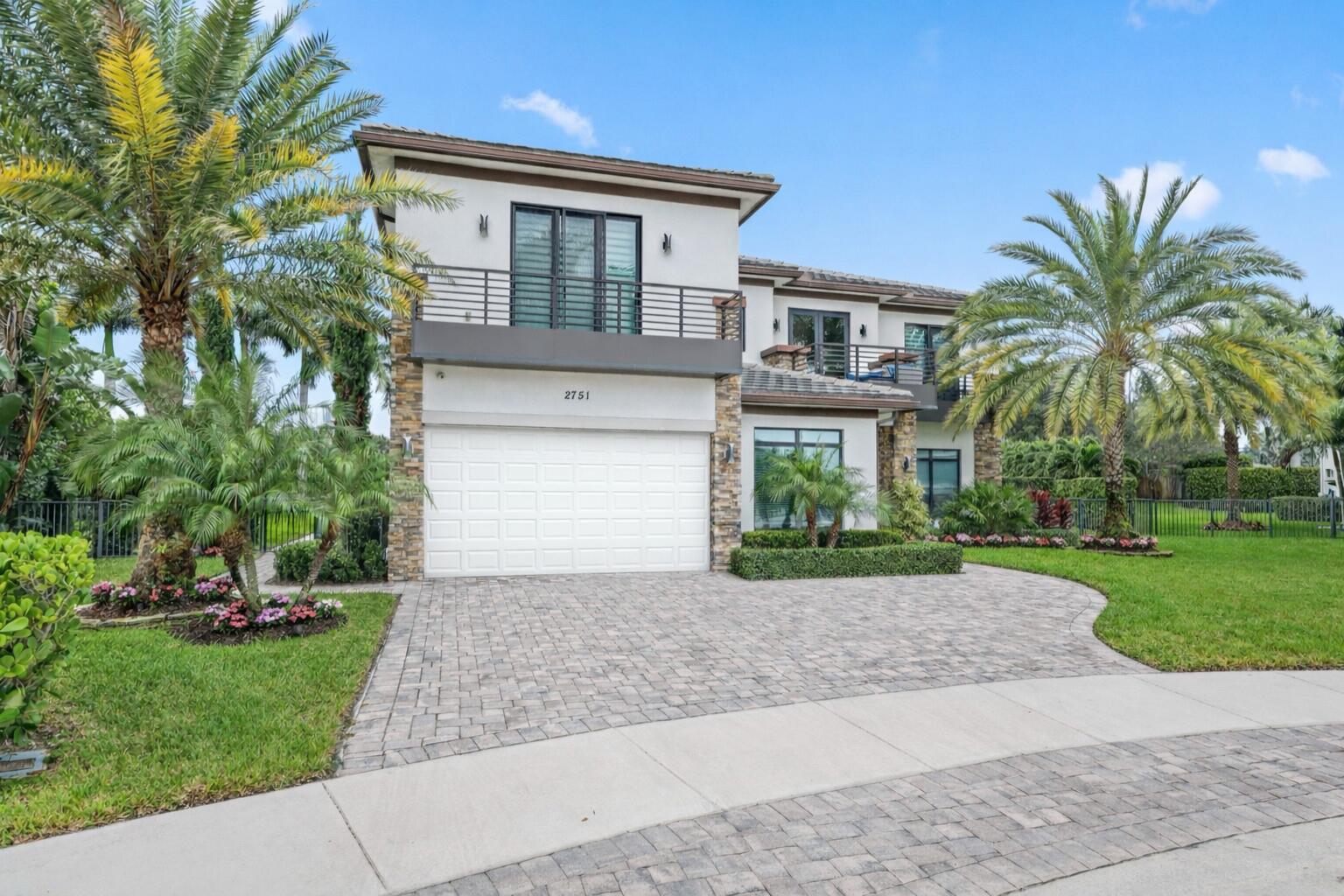 2751 Northwest 70th Boulevard Boca Raton, FL 33496 - Photo 76 of 76 a front view of house with yard and green space