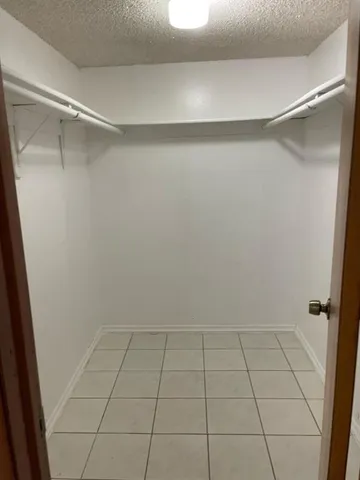 a bathroom with a close shower view