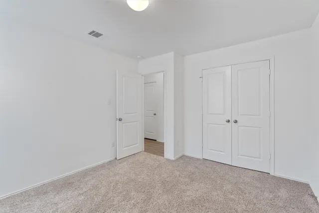 a bathroom with a toilet a sink and a bathtub