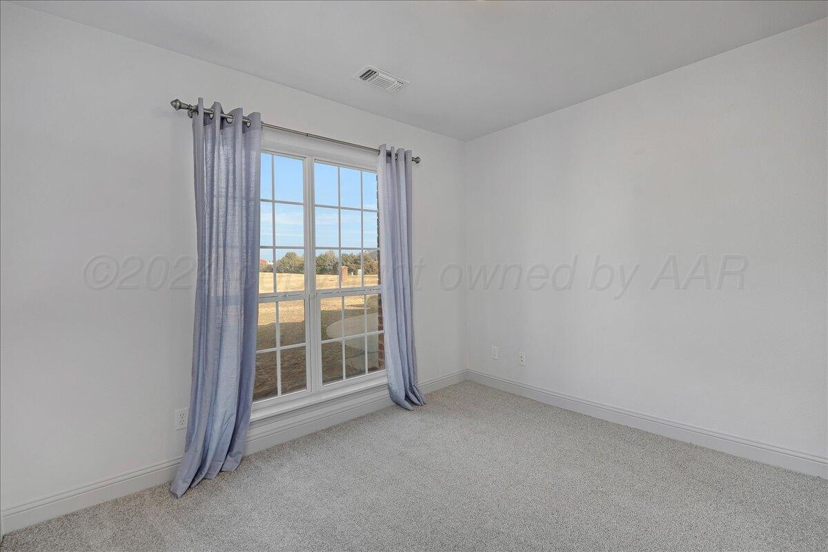 8501 Bryeson Lane Canyon, TX 79015 - Photo 20 of 25 a view of an empty room with a window