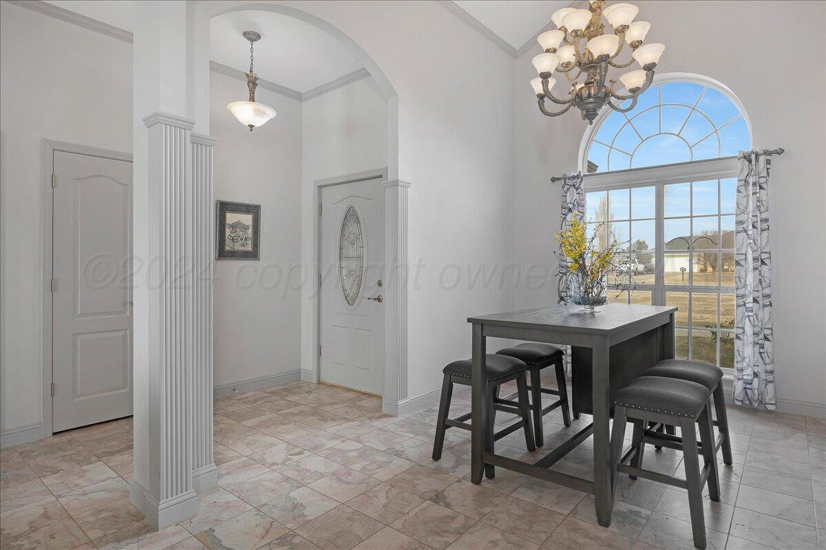 8501 Bryeson Lane Canyon, TX 79015 - Photo 6 of 25 a view of a dining room with furniture and chandelier
