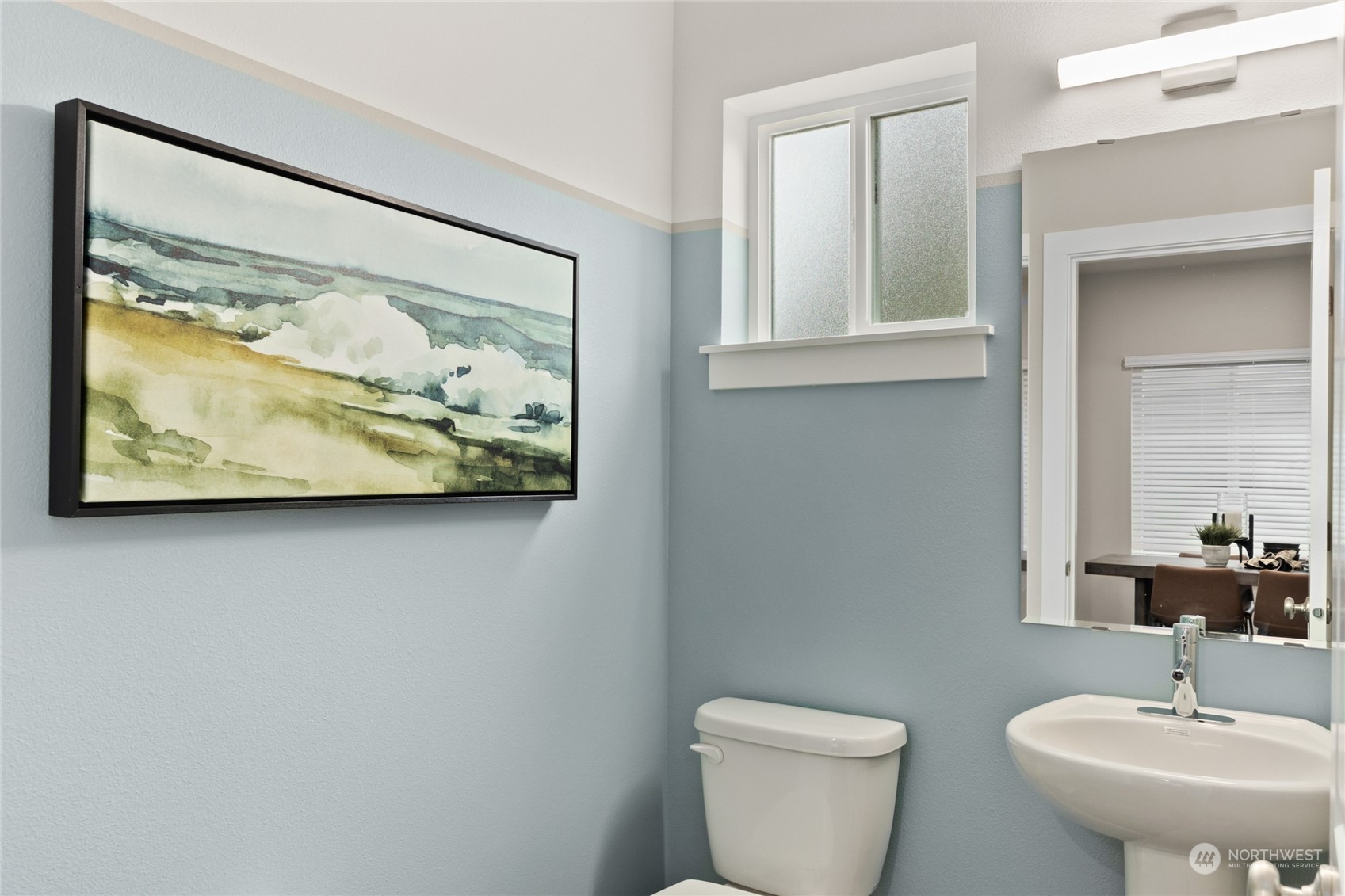 20801 3rd Drive Southeast Bothell, WA 98012 - Photo 20 of 34 a bathroom with a toilet a sink and mirror
