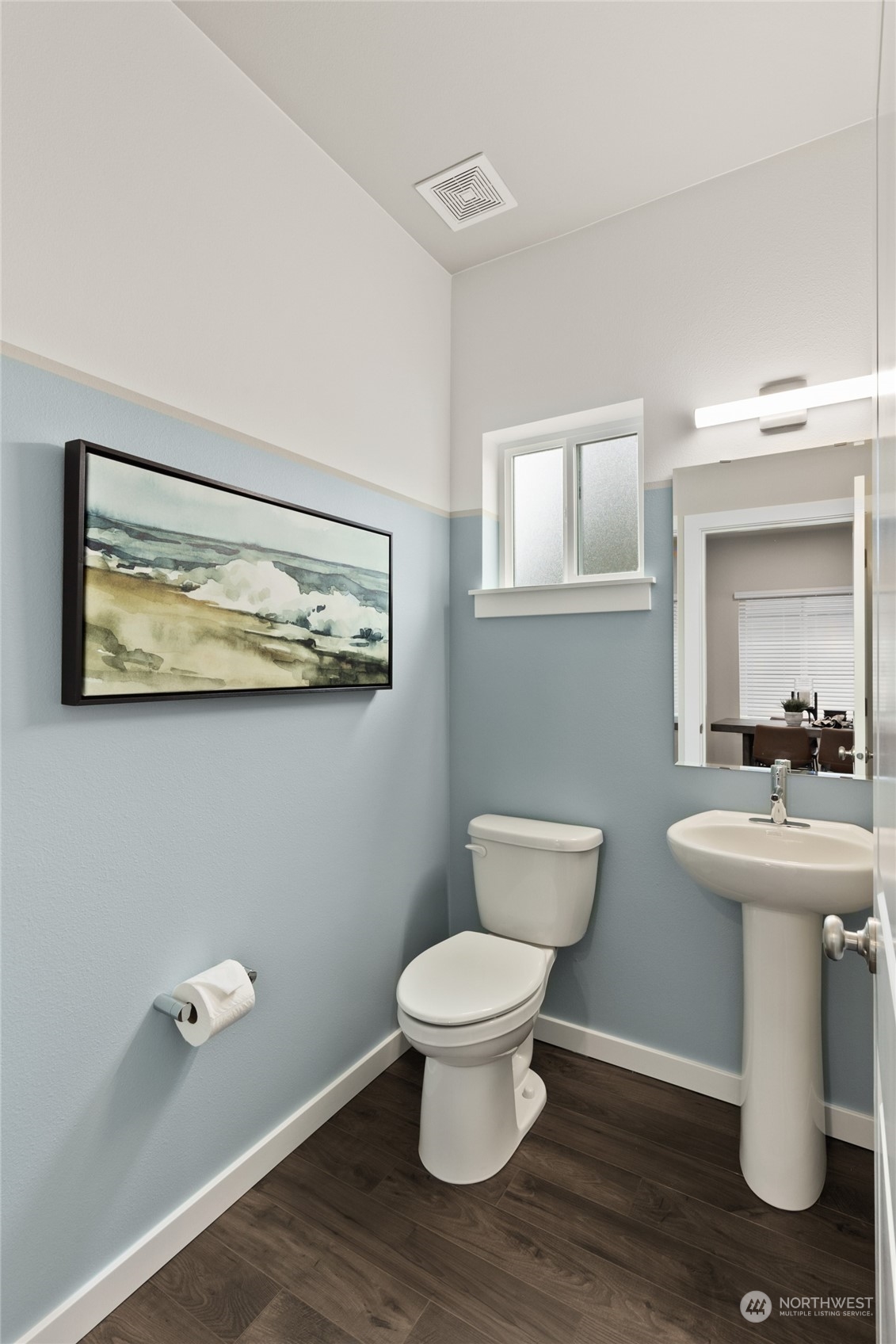 20801 3rd Drive Southeast Bothell, WA 98012 - Photo 21 of 34 a bathroom with a toilet a sink and mirror