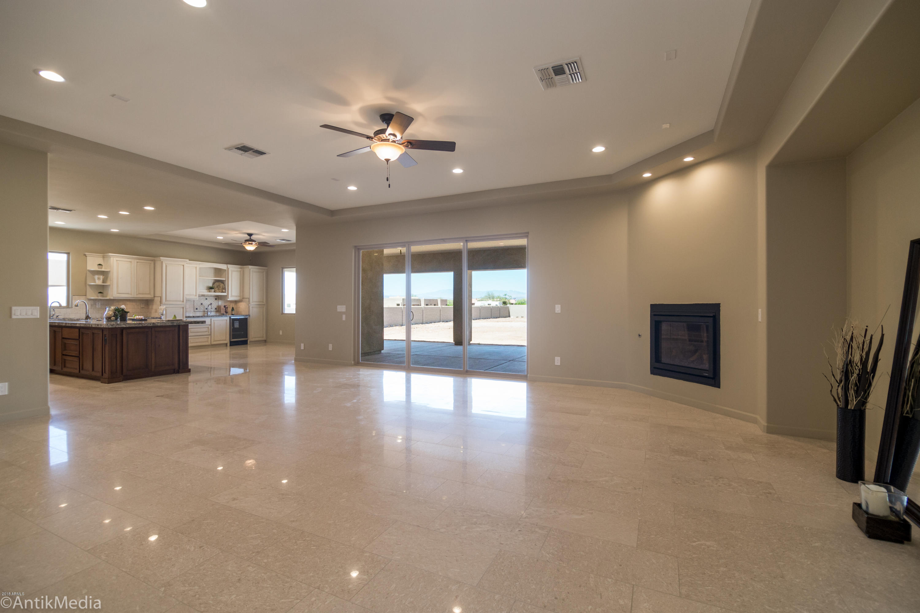 Great Room with Polished Travertine