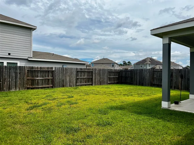 a house view with a garden space