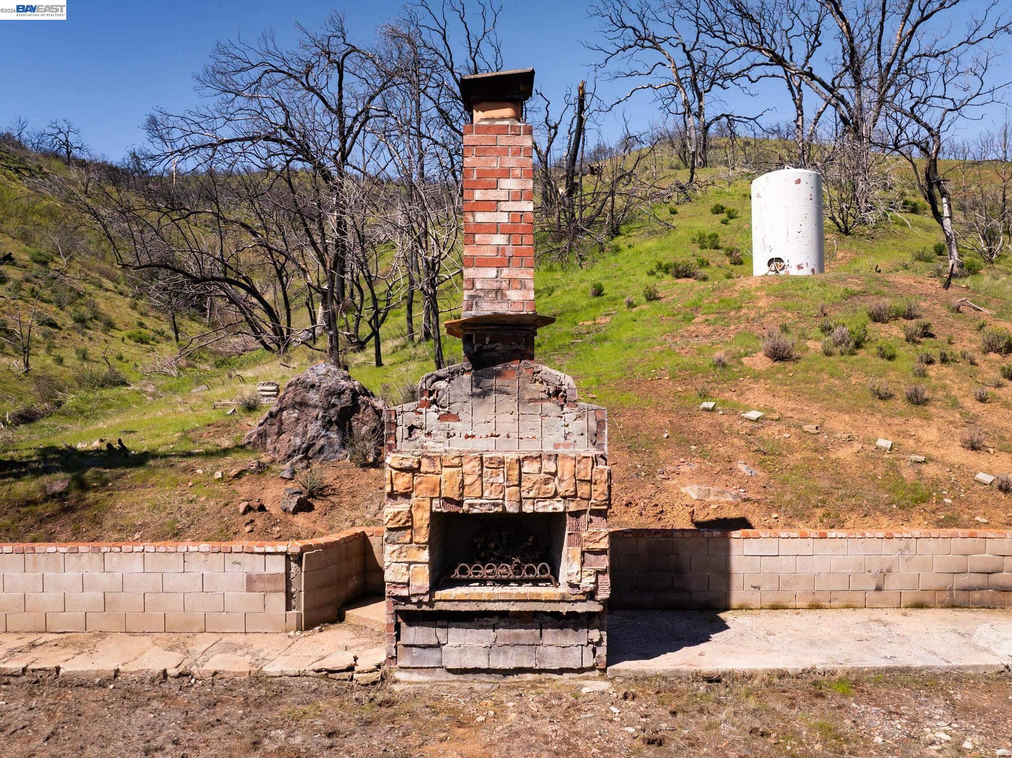 15676 West Corral Hollow Road Tracy, CA 95377 - Photo 6 of 26 a front view of a house with a yard