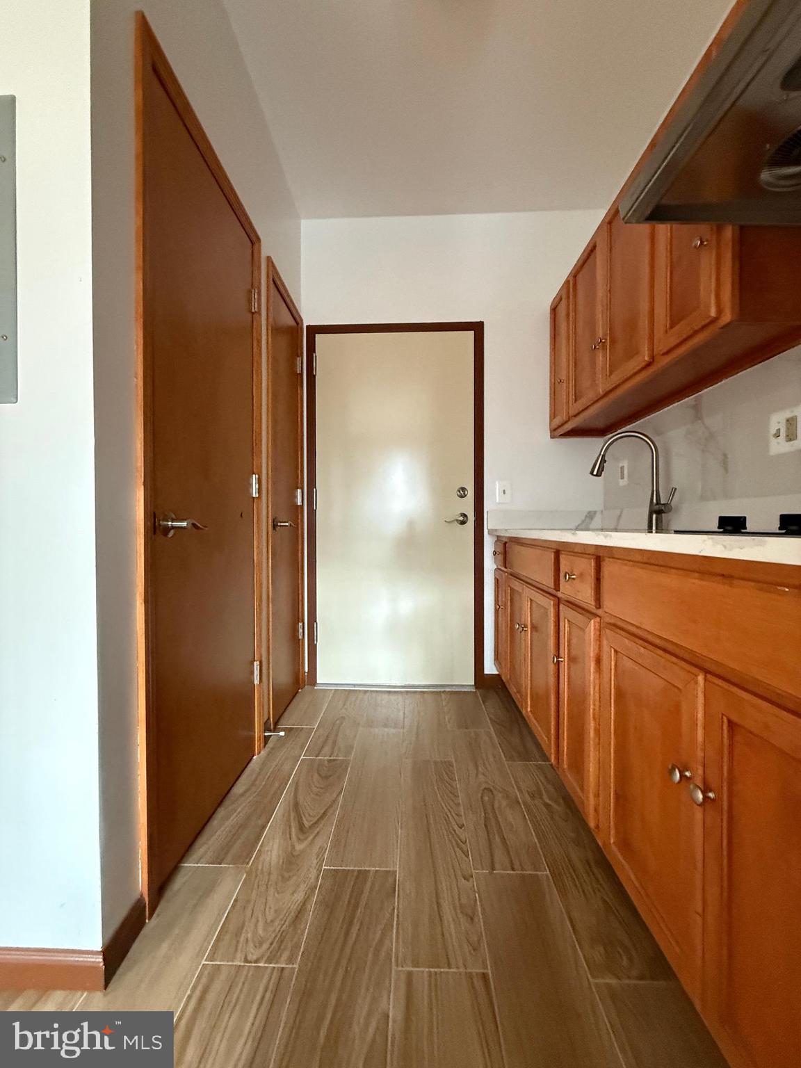 146 North 10th Street, Unit 3B Philadelphia, PA 19107 - Photo 6 of 8 a view of a kitchen with a sink