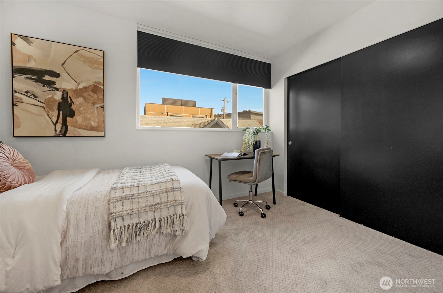 1966 South Grand Street Seattle, WA 98144 - Photo 16 of 25 a bedroom with a bed and a table in it