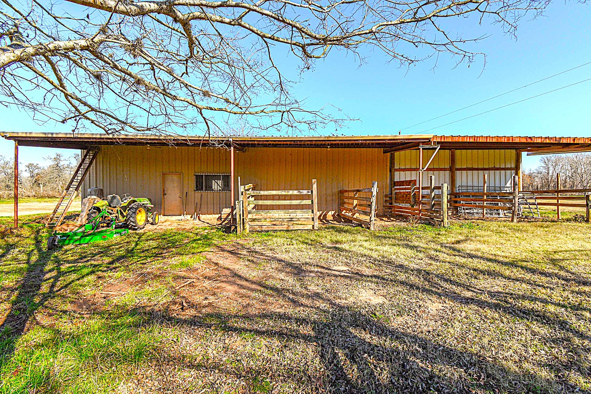 0 Hackamore Road Wallis, TX 77485 - Photo 6 of 33 Back of the barn has an overhang that faces south for livestock or parking farm equipment.