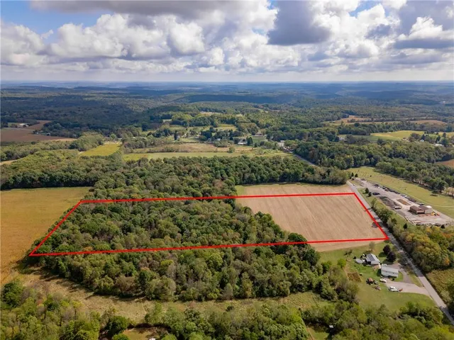 an aerial view of beach and city