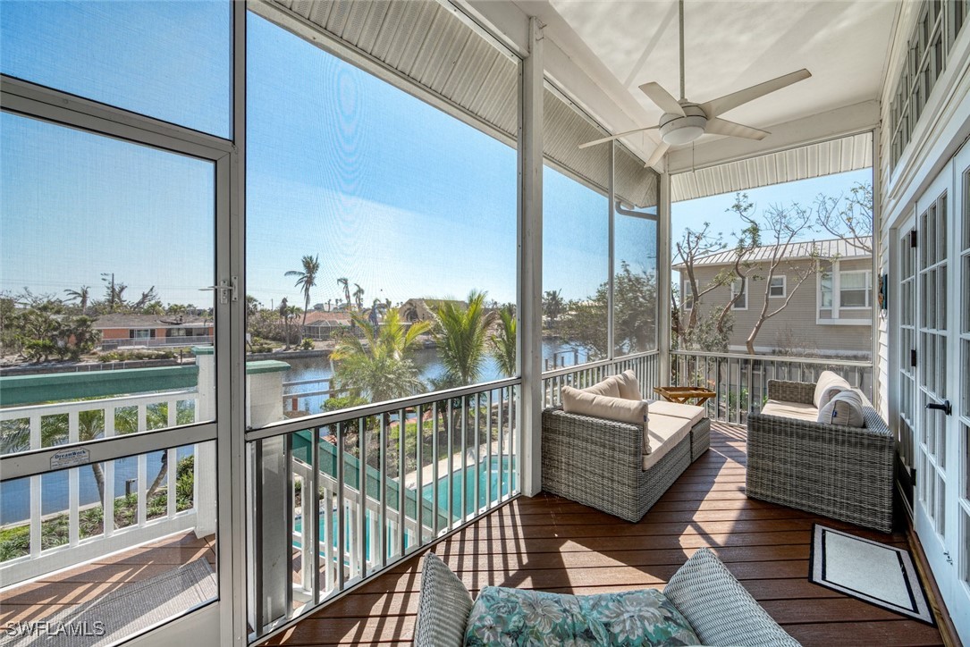 862 Beach Road Sanibel, FL 33957 - Photo 11 of 49 a view of a balcony with couch