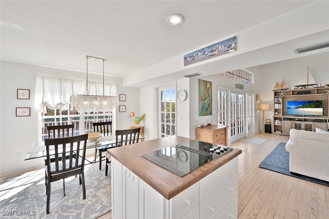 862 Beach Road Sanibel, FL 33957 - Photo 14 of 49 a living room with furniture a flat screen tv and a table