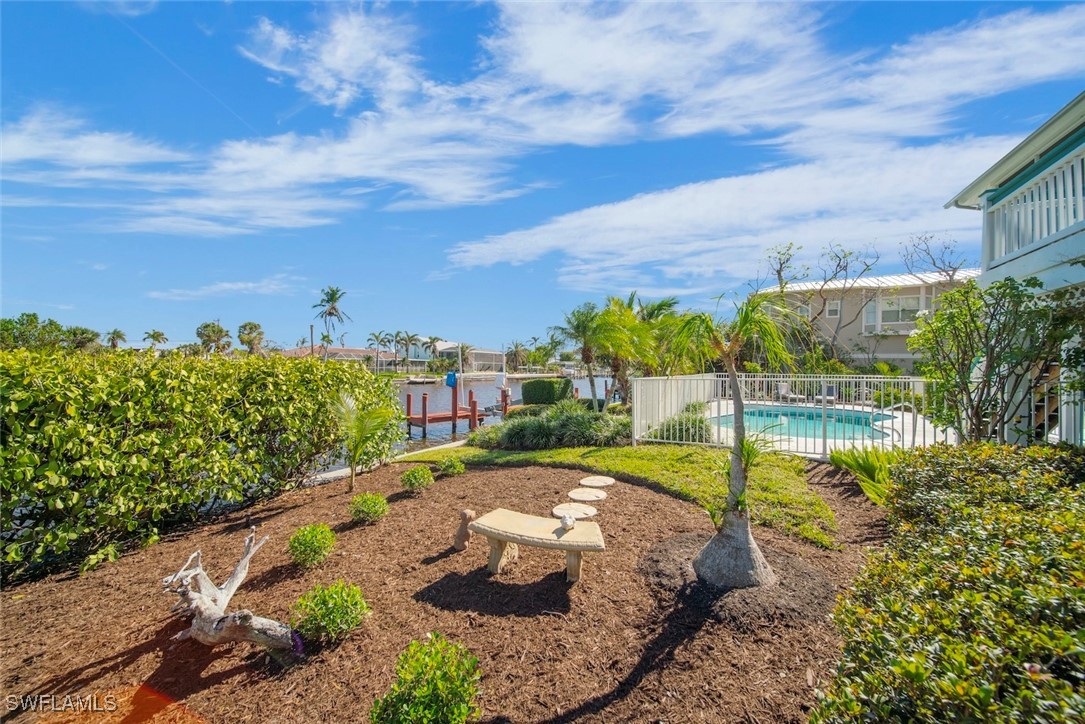 862 Beach Road Sanibel, FL 33957 - Photo 37 of 49 a view of a pathway with a yard