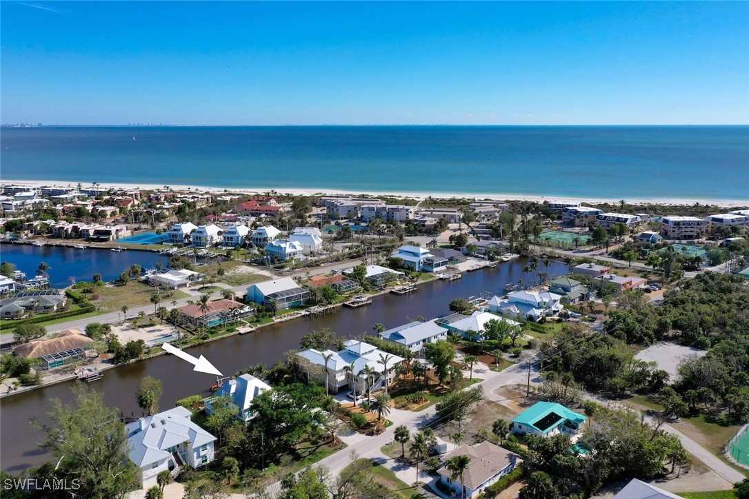 862 Beach Road Sanibel, FL 33957 - Photo 48 of 49 an aerial view of a city with ocean view