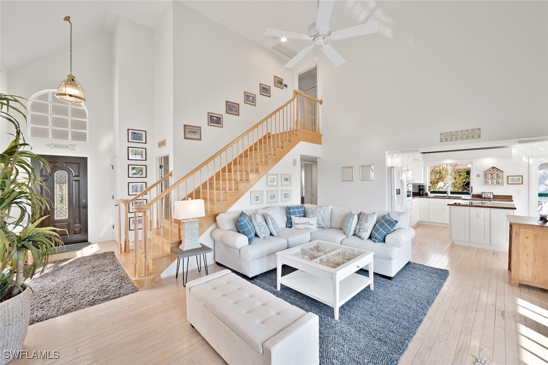 862 Beach Road Sanibel, FL 33957 - Photo 7 of 49 a living room with furniture and a dining table