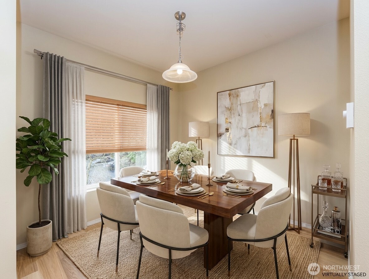5325 Military Road East, Unit B Tacoma, WA 98446 - Photo 11 of 27 a view of a dining room with furniture window and outside view