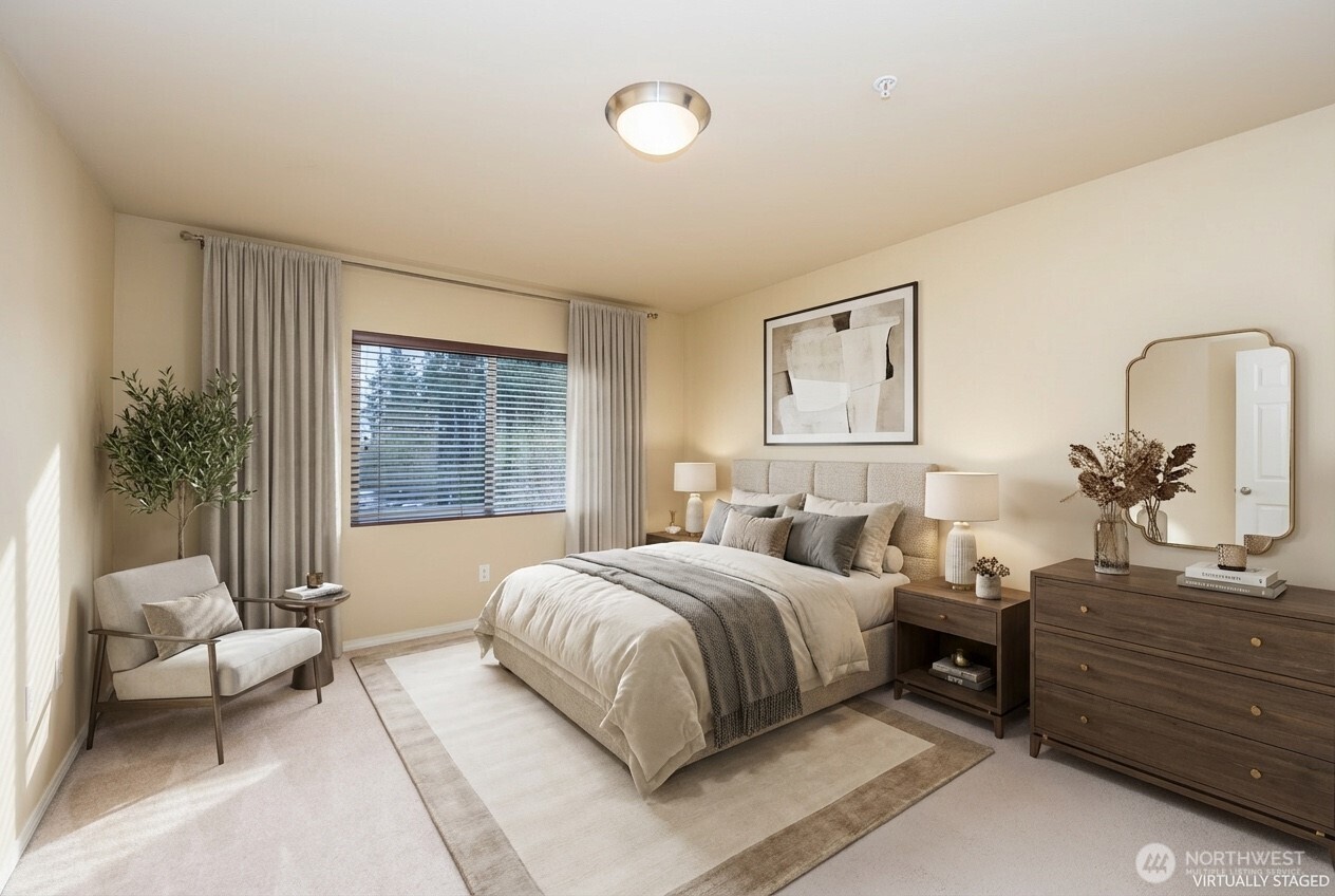 5325 Military Road East, Unit B Tacoma, WA 98446 - Photo 15 of 27 a bedroom with a bed and a couch