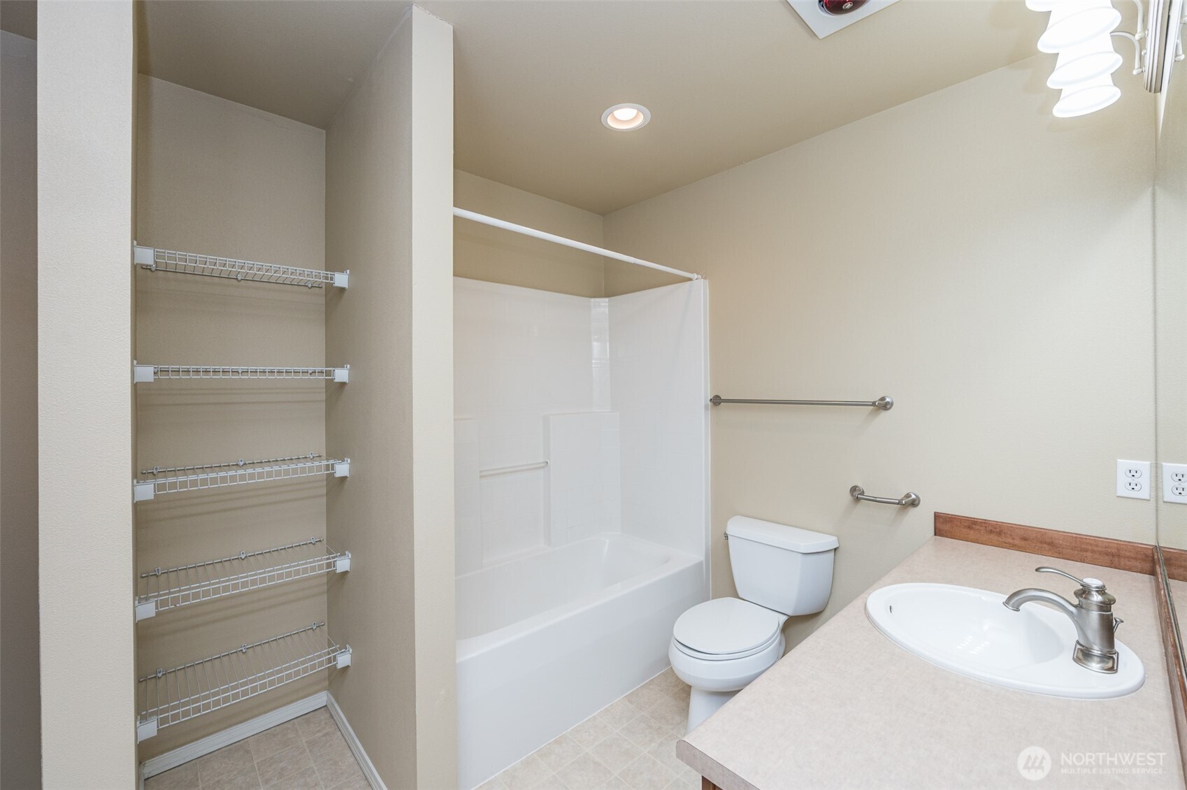 5325 Military Road East, Unit B Tacoma, WA 98446 - Photo 19 of 27 a bathroom with a toilet sink and shower